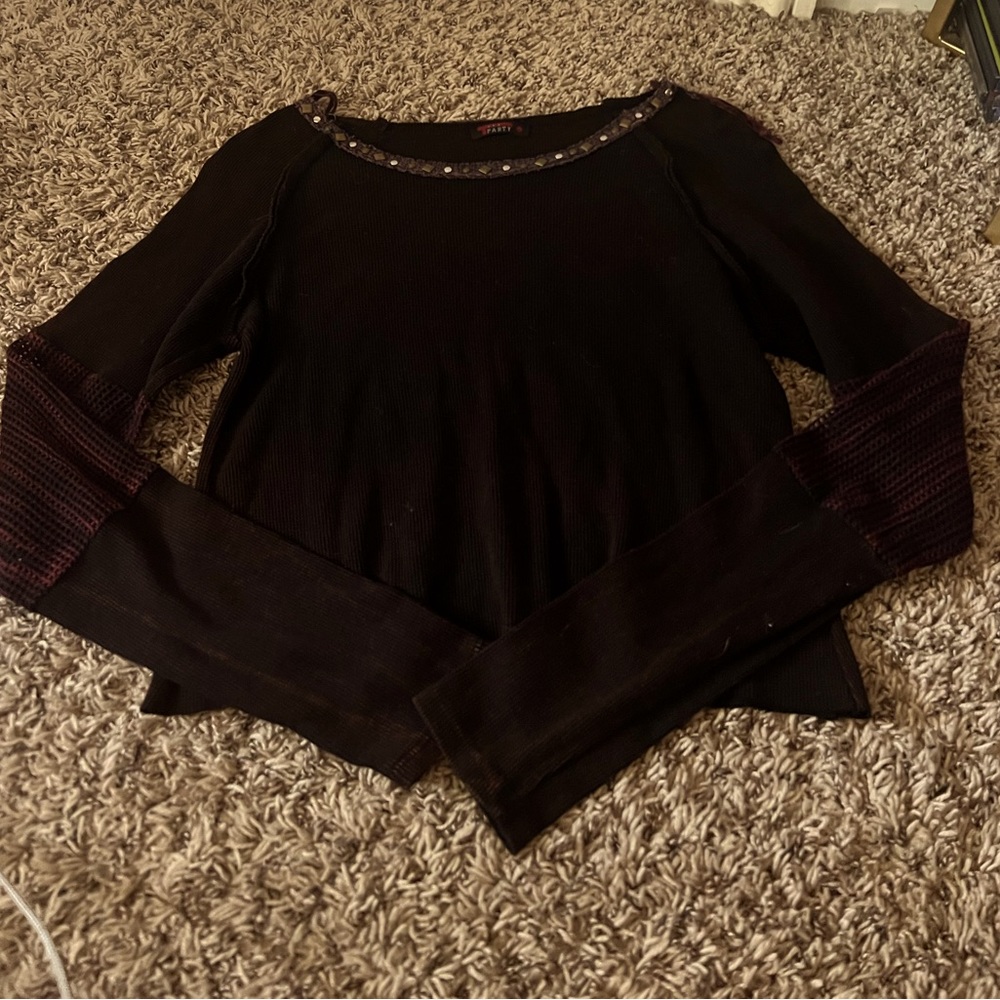 Long-sleeve top with cute detailing, size medium.